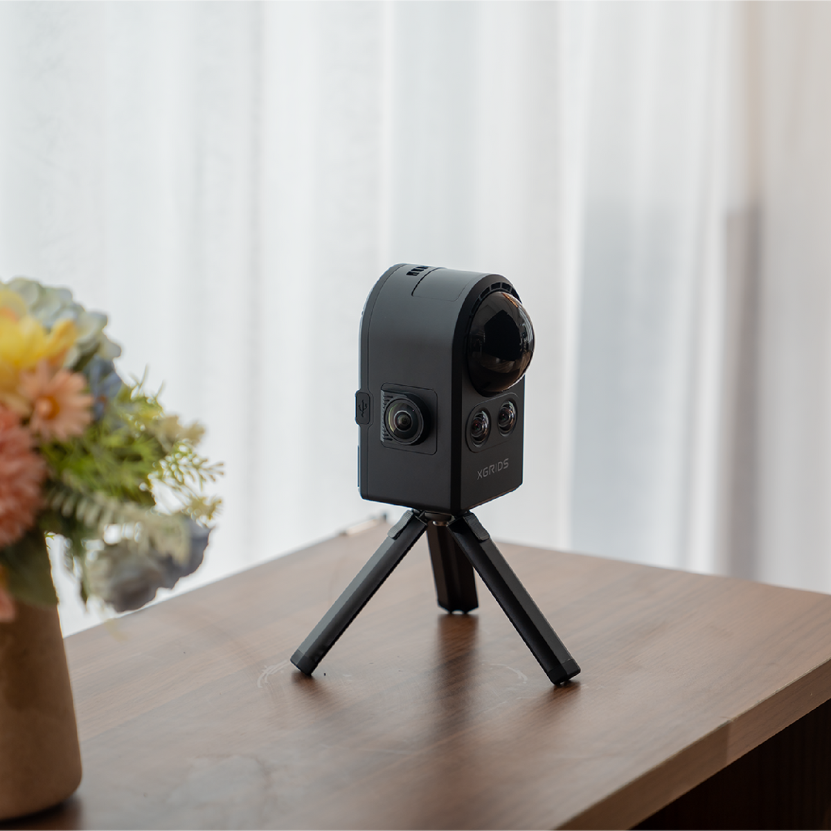 XGRIDS PortalCam on compact tripod